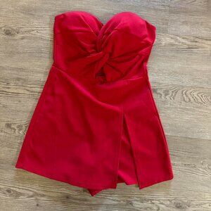 Bailey Blue red strapless romper with tie front and split leg.